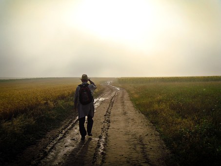 man on a dusty road